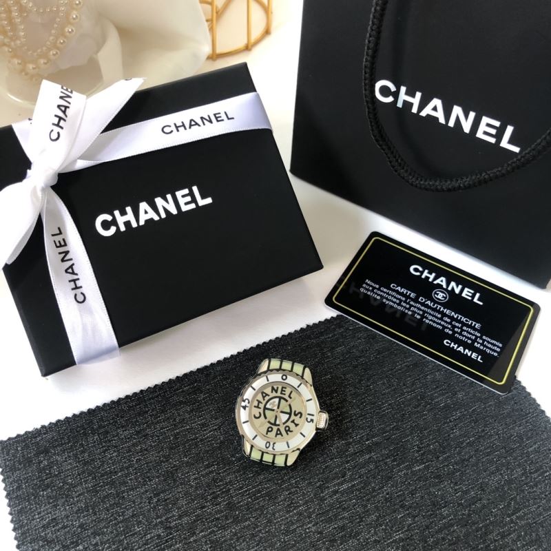 Ch*el brooches
